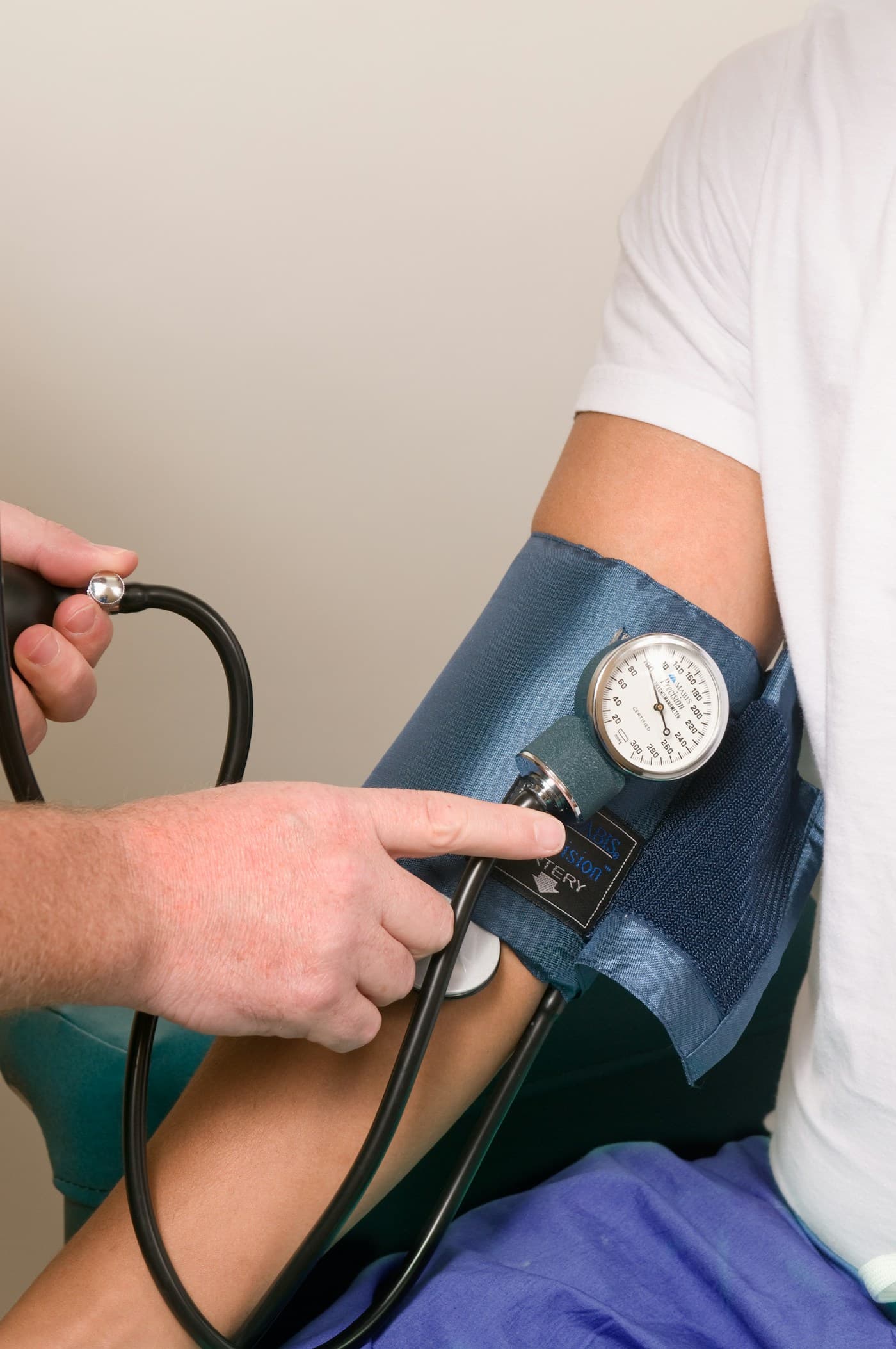 Clinician performing a placement-screening check on a student