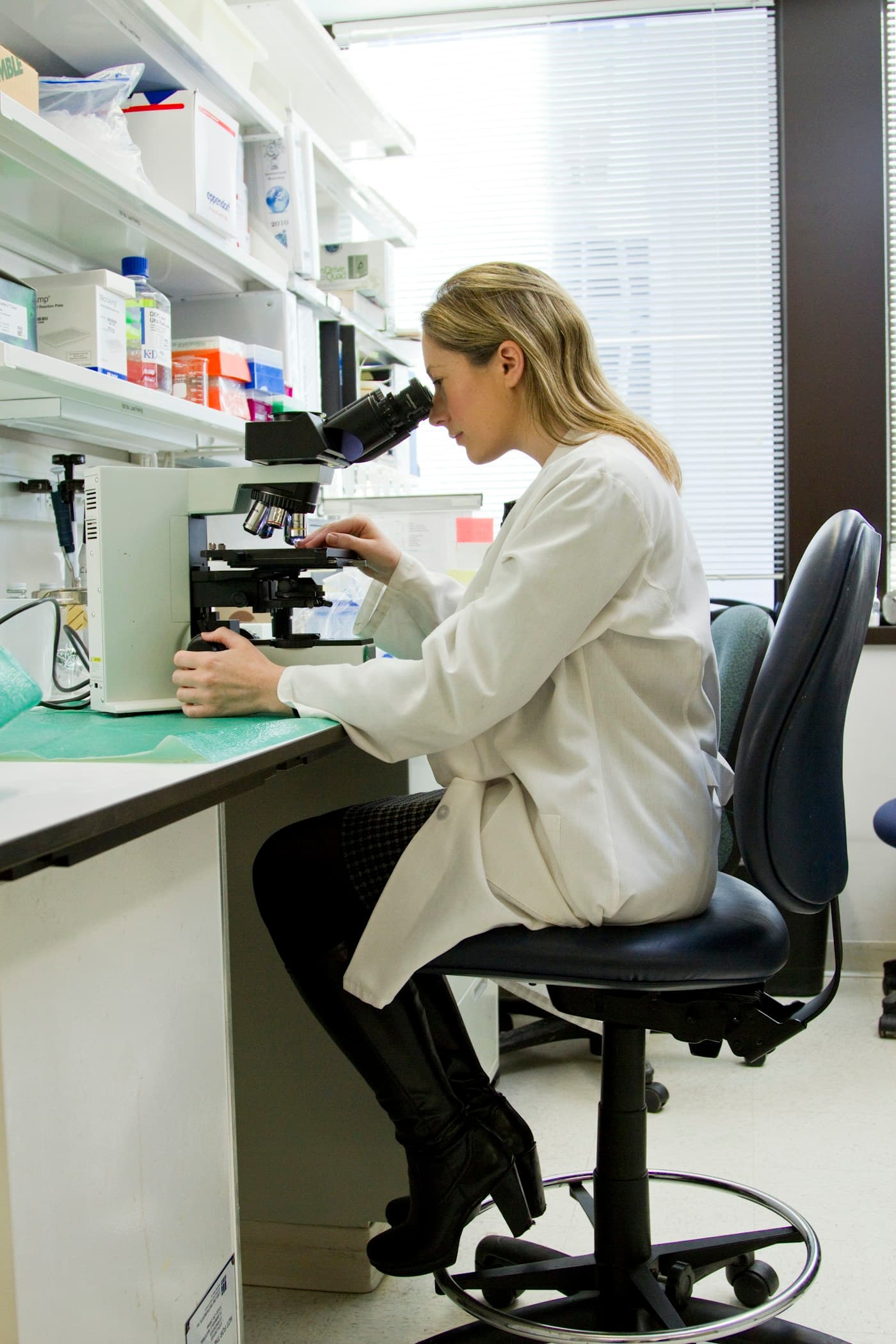 Clinic technician reviewing serology samples